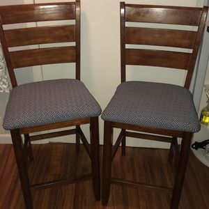 Two reupholstered high top chairs